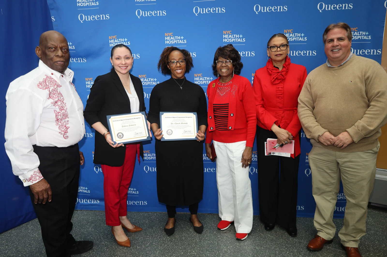 Yadira Navarro, Director of Community and Stakeholder Relations, receiving her  
Certificate of Special Congressional Recognition award. 