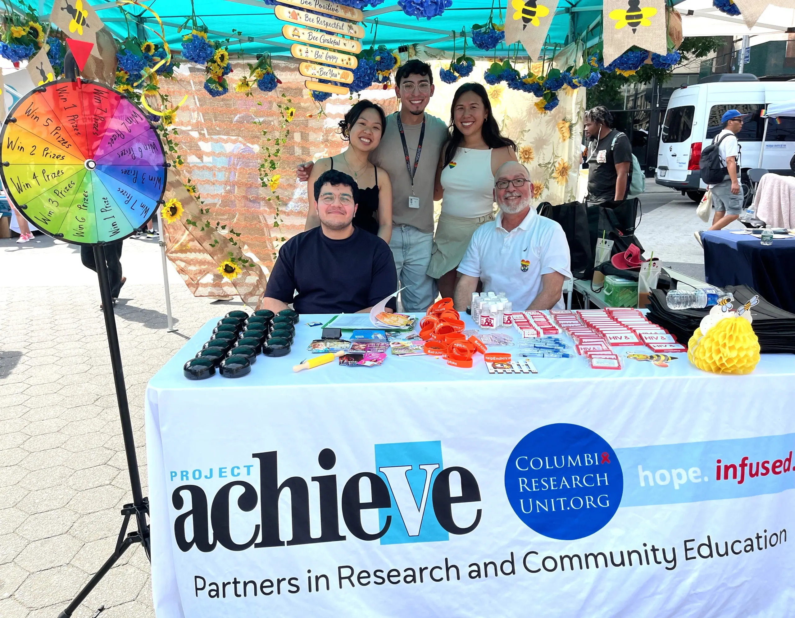 Project Achieve staff at National HIV Testing Day. Five staff members.