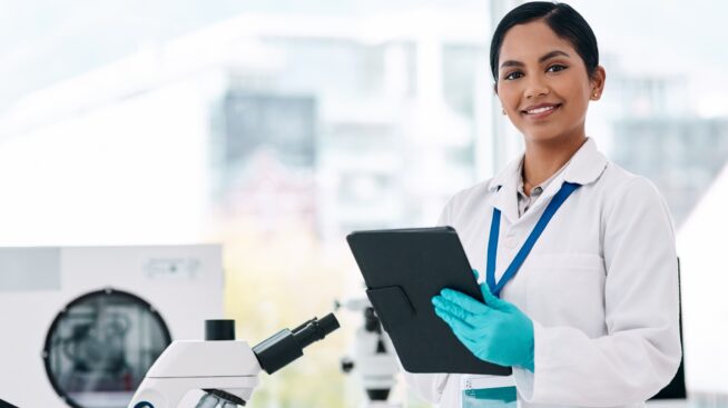 New York Blood Center lab researcher with a computer tablet